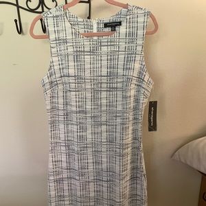 NWT Black and cream sleeveless sheath dress.